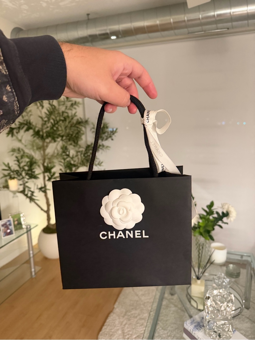 CHANEL Black Gift Bag with White Camellia Accent